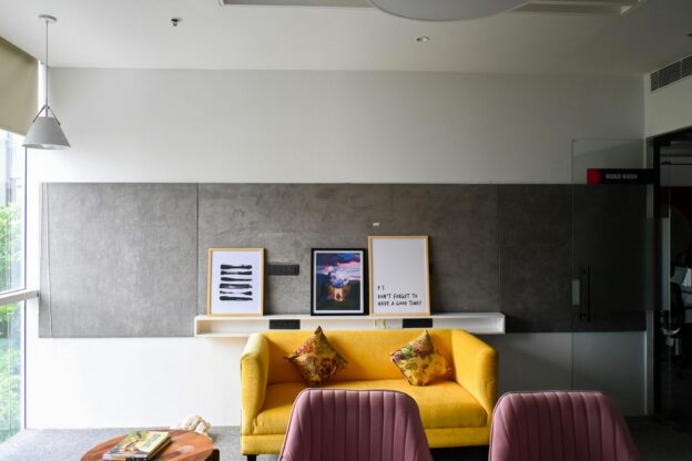 business meeting with Korean language presentation screen in background, professional setting, realistic high quality photo