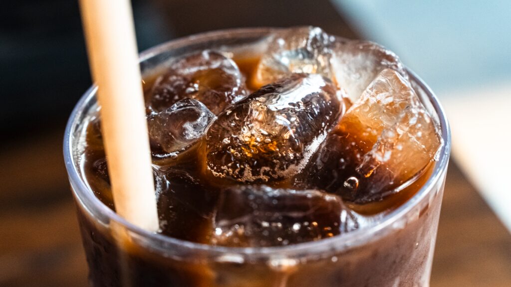An iced americano held during a hot Korean summer day