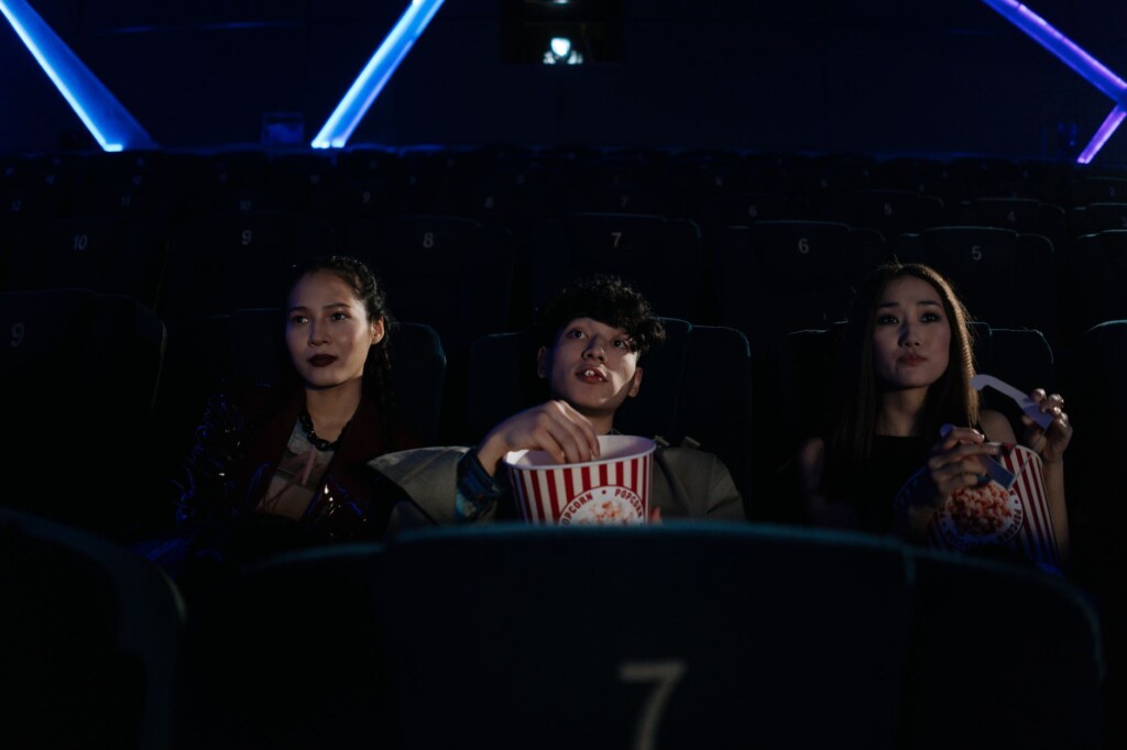 A Korean family watching a moving film together at night